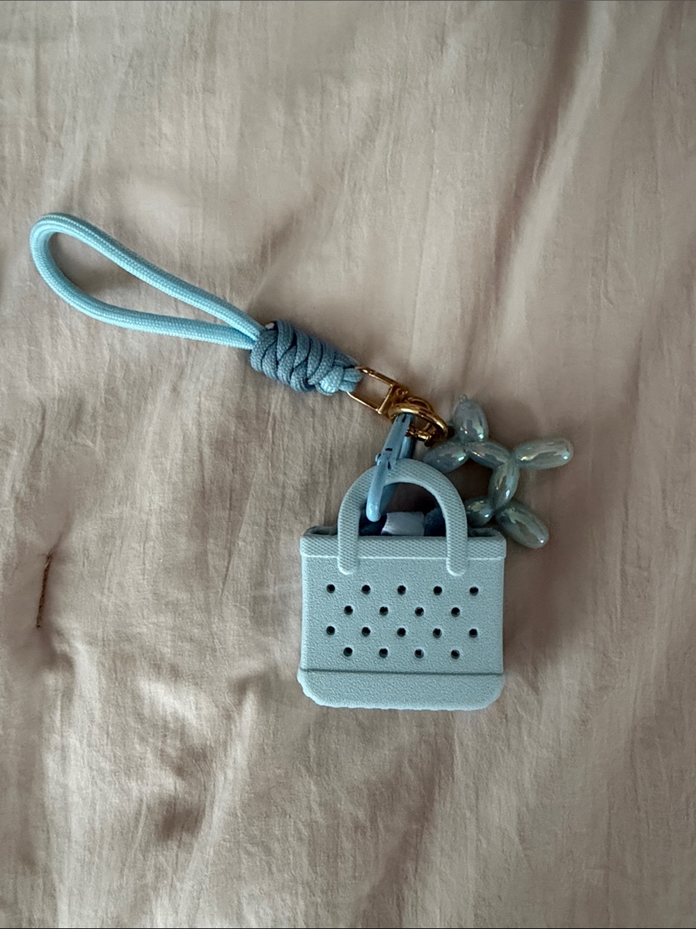 Tote bag makeup puffs charm.
